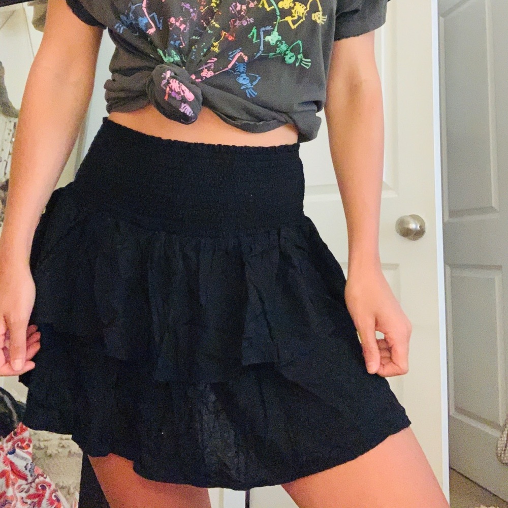 Black smocked mini skirt